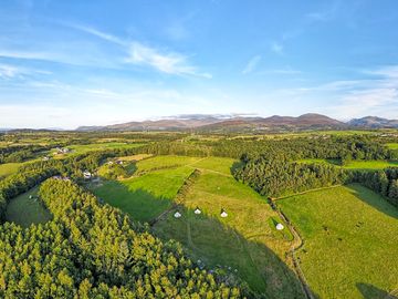 Aerial view of the site, with Eryri National Park and Yr Wyddfa