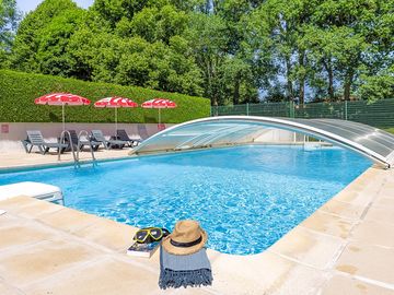 Part-covered swimming pool