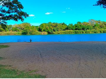 Pitch bordering the river