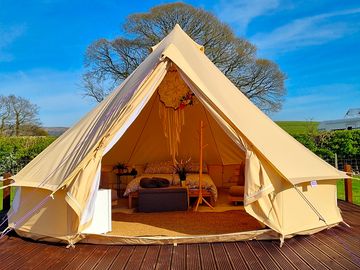Tent pitched on wooden decking