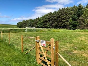Football field and enclosed dog walking field