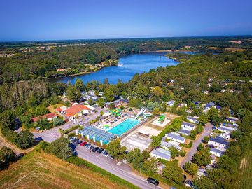 Aerial view showing the swimming pool and lake