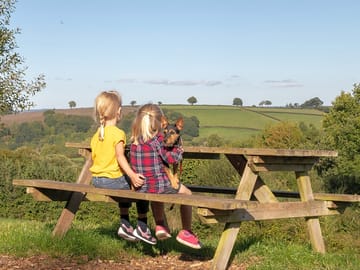 Children sitting on a picnic bench (added by manager 09 Nov 2022)
