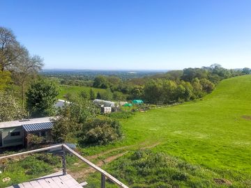 View of the pitching field and check-in caravan in the sunshine (added by manager 29 Jun 2023)