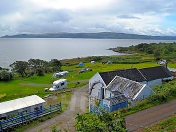 Views across the site entrance south towards Mull