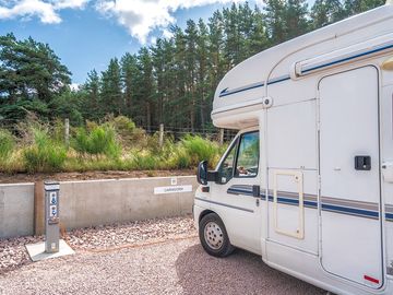 Motorhome pitch overlooking trees