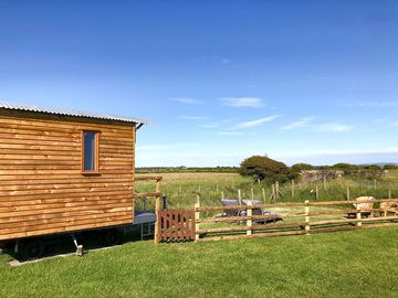 Shepherd's hut exterior and private garden