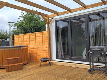 Adventure pod decking and private hot tub