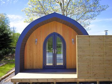 Superior camping pod with wood fired hot tub