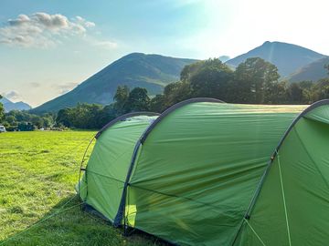 Grass tent pitch