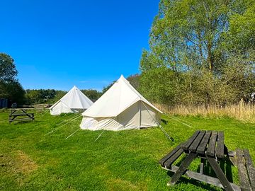 Bell tents come with picnic tables