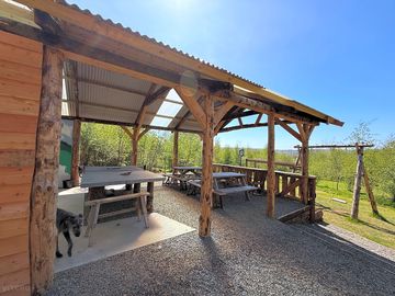 Our snuggery,a covered area, perfect for watching the sun go down, ping pong tournaments and dinner!
