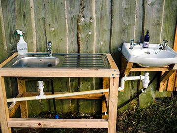 One sink for washing up, one for washing your hands