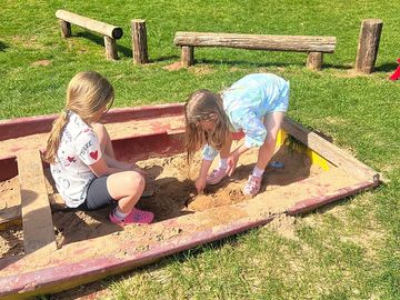 Sandpit in wooden play area