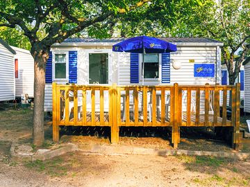 Exterior of an amber two-bed caravan