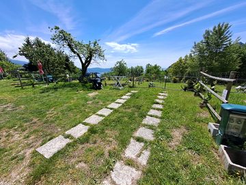 Piazzola plus green immersed in greenery