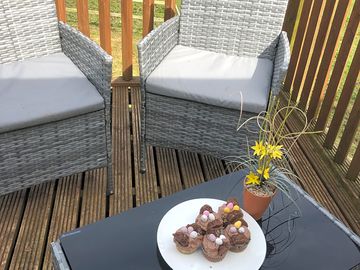 Enjoy afternoon tea or a glass of wine with lovely views from your private decking