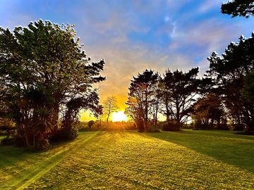 The sunset from the summer camping field towards the end of summer