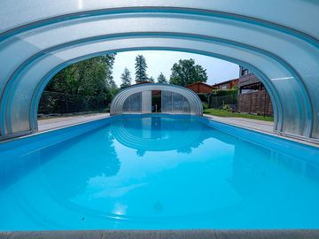 Partially covered swimming pool