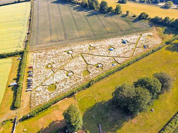 A wider view overlooking the site towards the Malvern's