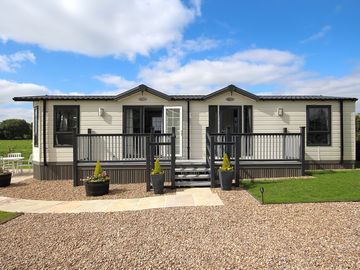 Lodge with parking, decking and private garden