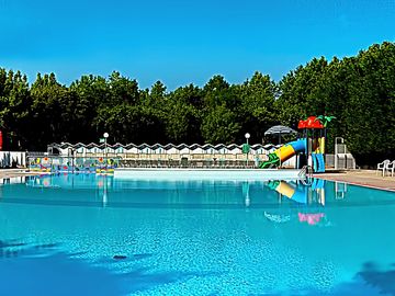 Swimming pool with slides
