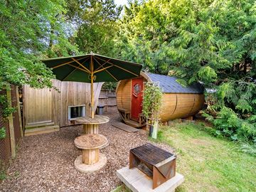 The Owl pod features a comfortable king size bed, private wood-fired hot tub and an alfresco kitchen