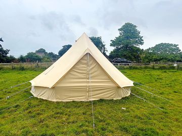 Elm bell tent comes with a hessian floor, camp beds and a firepit