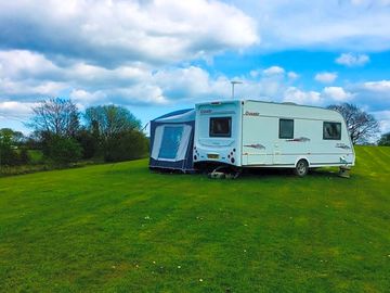 Top banking rise with a touring caravan