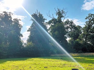 Morning sun on the campervan meadow