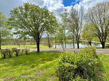 Grass pitch with lake view