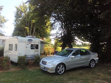 Car parked by the pitch