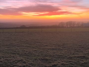 Sunset over the camping field