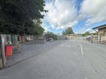 Arriving at the park by reception and shop. seating area opposite reception.