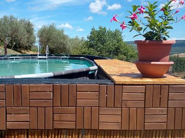 Our pool with a stunning Chianti view, perfect for relaxing in nature