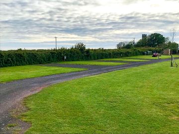 Electric hardstanding grass touring campervan pitch