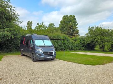 Hardstanding pitches with grass space for an awning