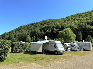 Pitches with a forest backdrop