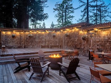 Dining deck with a firepit