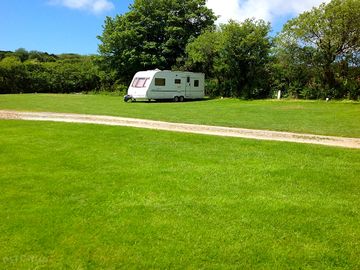 Sheltered electric grass pitches