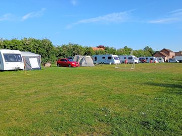This pitch is half way up the field and a short walk to one of the fishing ponds.