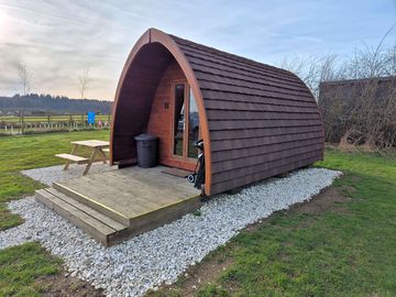 Camping pod with picnic bench
