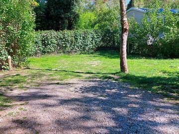 Pitch surrounded by hedges for extra privacy