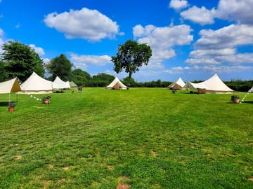 the 7 bell tents with plenty of space to play in the middle
