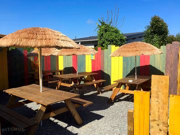 Shaded picnic tables