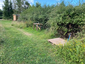 The shared facilities: compost toilet, shower, washing up area, drinking water tap