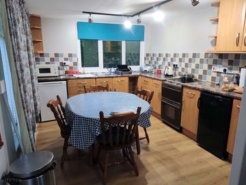 Kitchen with provided facilities.