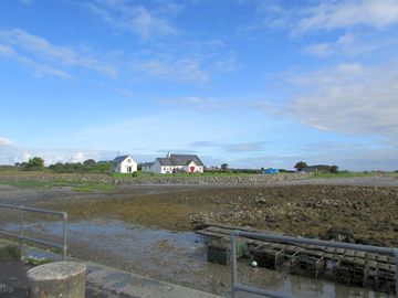 Oyster farming trestles exposed at low tide