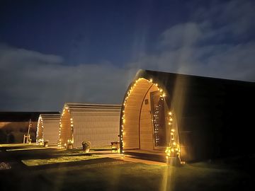 Pods lit up at night
