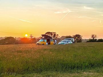 Sunset campers at the wild meadow